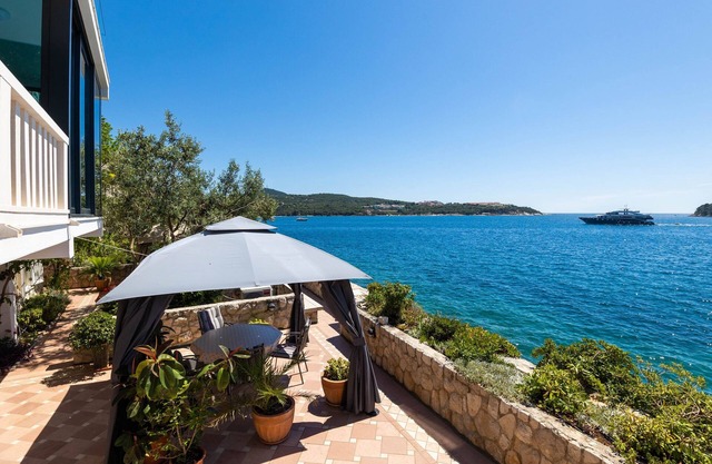 Unique Beachfront 2BDR Apartment With a Private Beach and Spacious Terrace