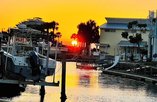Unique waterfront home, Hot Tub, private boat dock, walk to beach, pet friendly