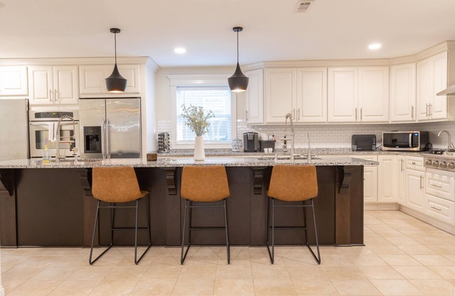 Updated home with chef's kitchen, open floorplan, and large yard