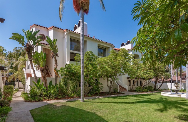 Upscale West beach townhome with solar heated pool