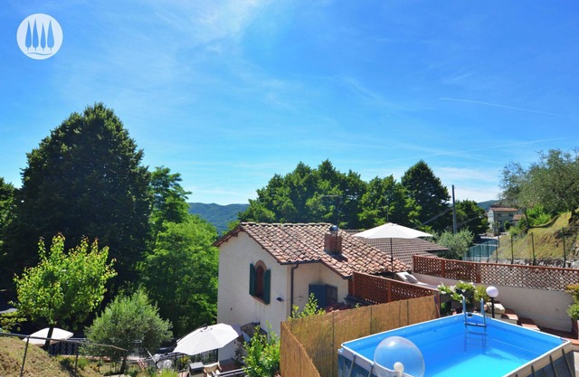Vacation home with hillside view and pool