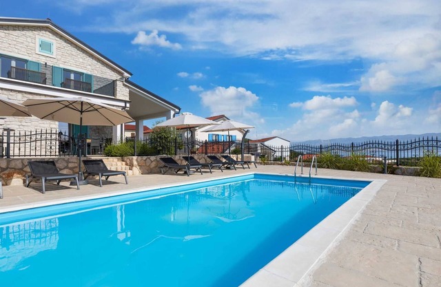 Villa Andreja – Stylish Oasis with Heated Pool & Sea View