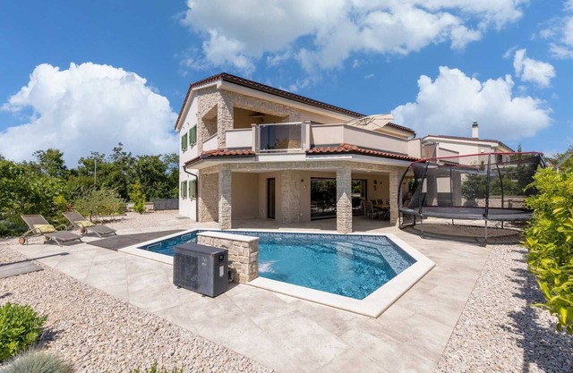 Villa Divina – Coastal Villa with Heated Pool and EV Charging Station