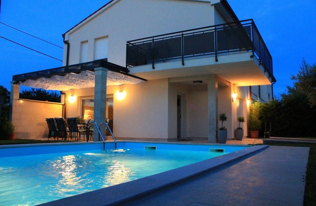 Villa Divina with heated outdoor swimming pool