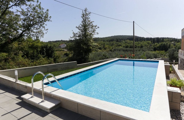 Villa Harmonia with patio and shared pool