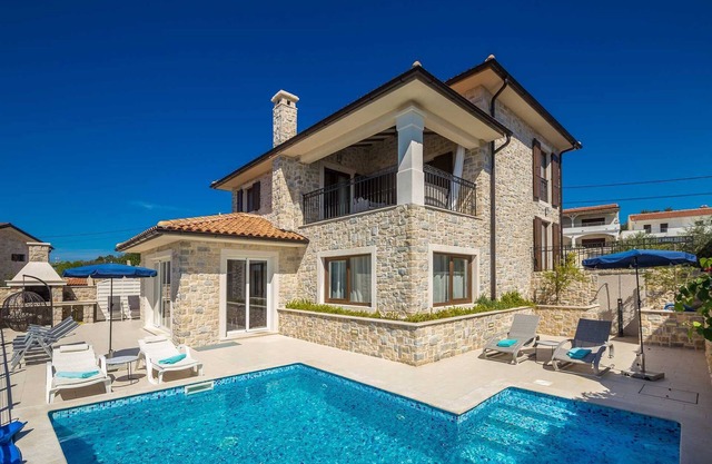 Villa LURDA with a magnificent sea view and heated pool