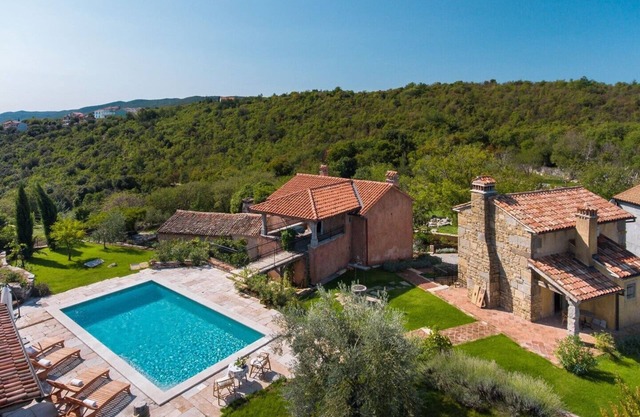 Villa Malini with Pool, Sauna and Fenced Garden