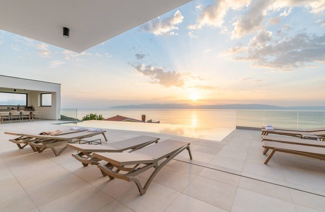 Villa rOvni with a stunning sea view and heated pool