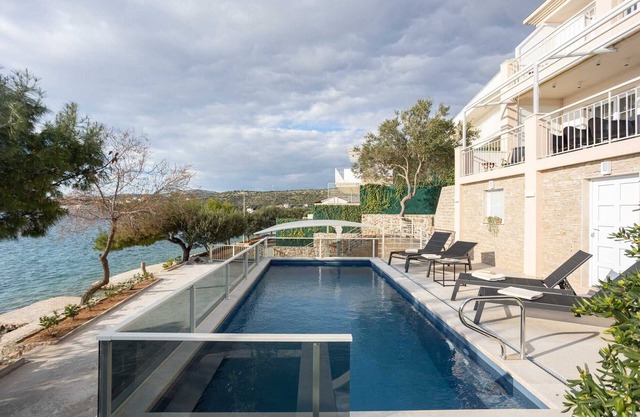 Villa Sea Touch - beachfront villa for eight, amazing views and a heated pool