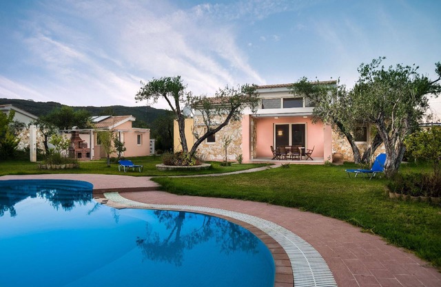 Villa Thalassa with a swimming pool and garden