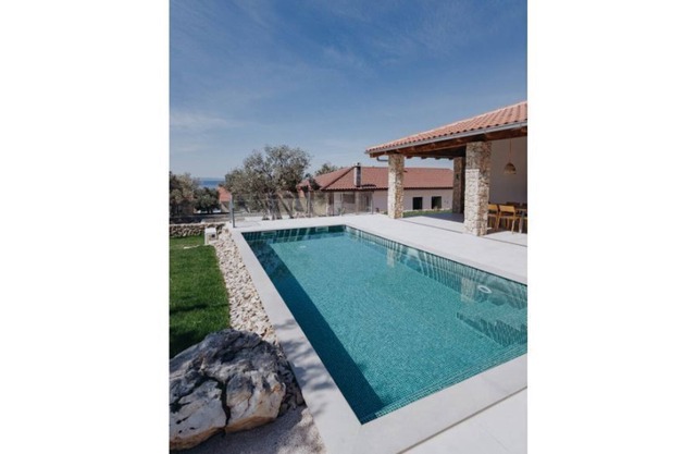 Villa with heated pool and sauna in olive grove