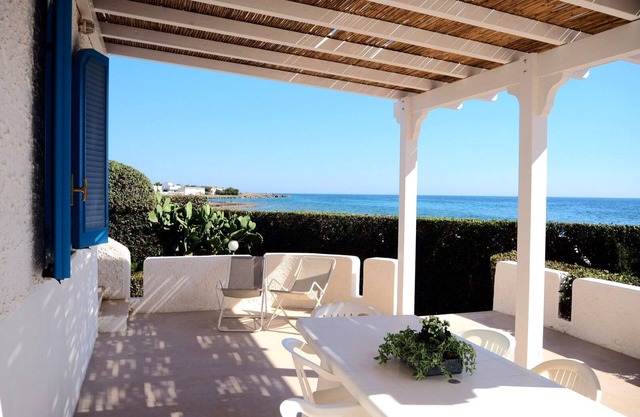Villa with pier by the sea