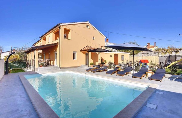 Villa with swimming pool and children's playground