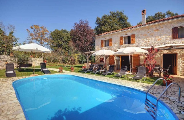 Villa with swimming pool and children's playground