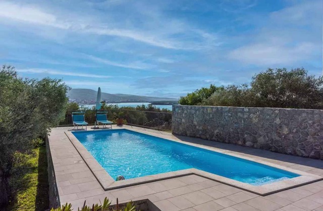 Villa with swimming pool surrounded by Mediterranean nature