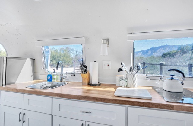 Vintage Airstream near the Catalina Mountains by RedAwning