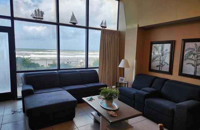 Walk right out to the beach, pool and tiki bar from this 1 bedroom deluxe condo