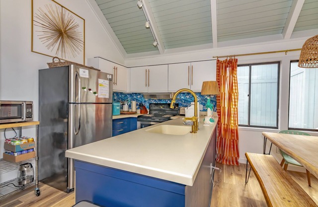 Walk to the beach or pool in this cozy villa. 2 deck spaces with 2 golf carts for enjoyment