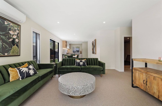Warm and stylish new home close to river, lake, restaurants and golf course.