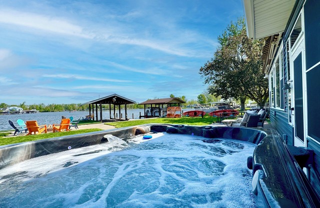Waterfront Cabin with Hot Tub, Outside Bar & Private Dock!