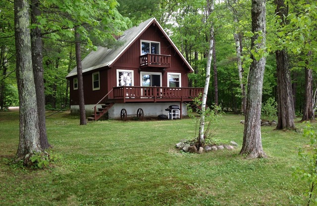 Waterfront Chalet with private beach in the White Mountains of New Hampshire.