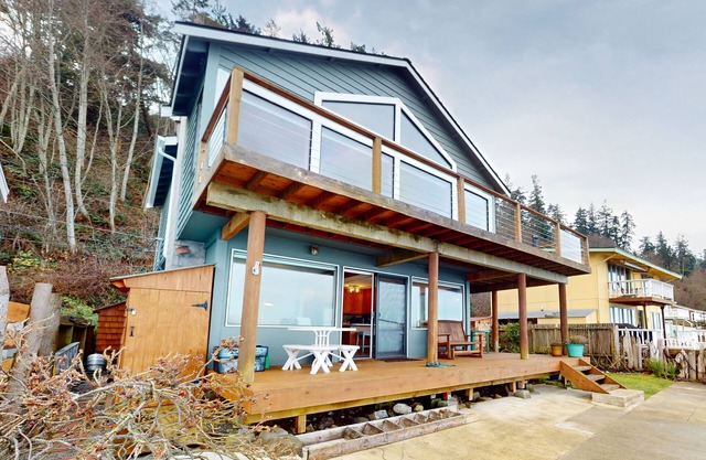 Waterfront home with views, deck and open concept living