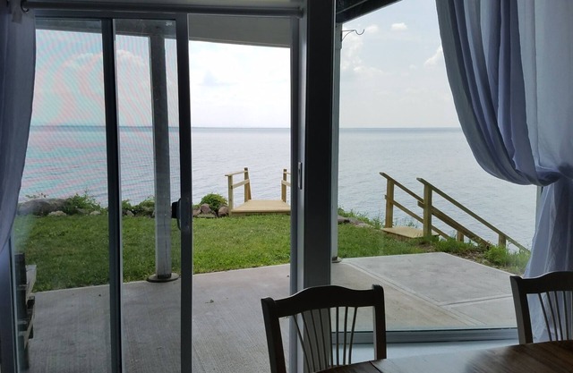 Waterfront pet friendly retreat located on Oneida Lake in Cleveland, NY.