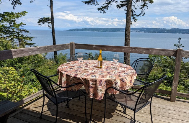 Waterfront retreat with panoramic sea views