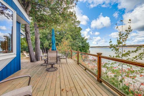 Waterfront Suttons Bay Cottage with Fire Pit!