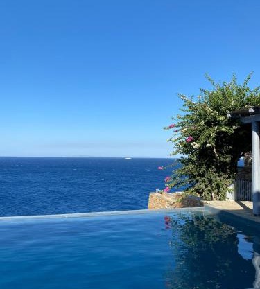 Waterfront villa "Afros" with a pool, direct access to the sea and a small beach