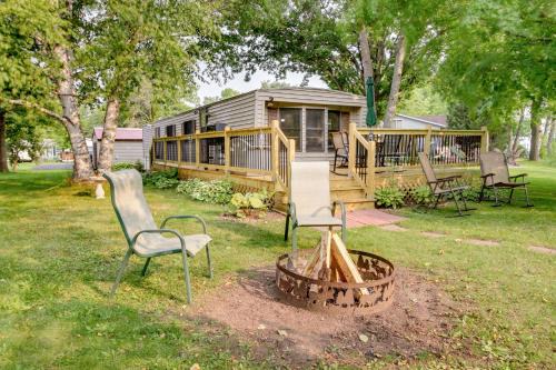 Waterfront Wahkon Home with Wraparound Deck and Docks