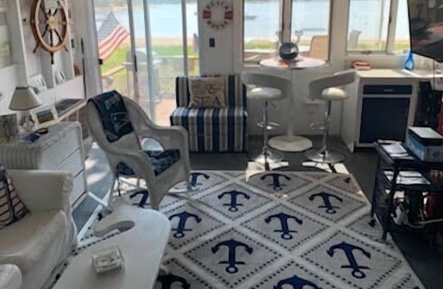 Welcome to Hideaway Retreat, a cozy get-a-way cottage with water views of Buttermilk Bay!