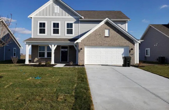 Welcome to Woodhaven! Brand new home on a quiet pond in a great neighborhood.