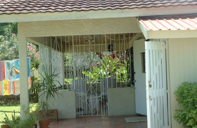Welcome to your Cosy Caribbean cottage, minutes from the beach.