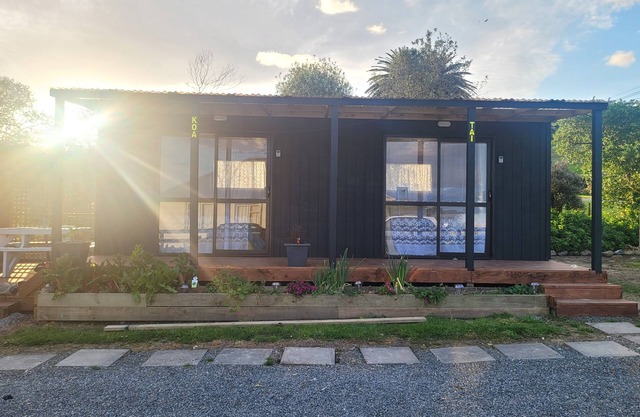 Whare Koa awaits to provide that relaxing ambience for you with all day sun!