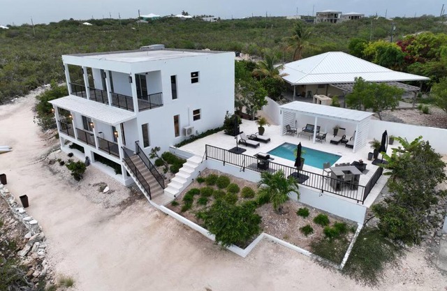 White Modern Flamingo Lake Villa
