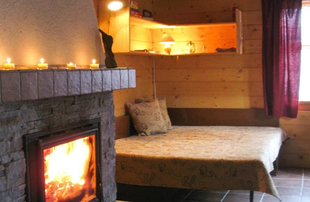 Wooden log cabin in traditional style