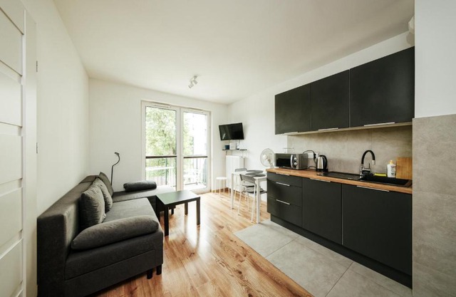 Wygodny apartament niedaleko centrum by Krakow Home