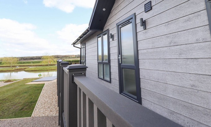 Grantham Cabin | 101 WATERS EDGE, with a garden in Marston, Lincolnshire