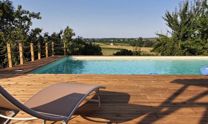 Moulinet House | 15th century house with swimming pool in the middle of orchards