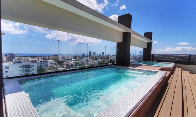 Santo Domingo Condo | 1br Luxury Condo Jacuzzi, gym Mountains with parking lot