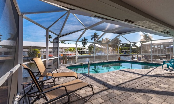 Saint James City House | 2/2 Pool Home on the Water, Boat Lift Included!