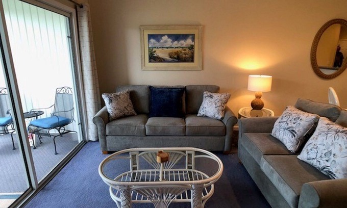 Sea Trail Condo | 2 BDRM Sunset Beach Condo: Screened Patio with view of Jones/Byrd 10th hole.