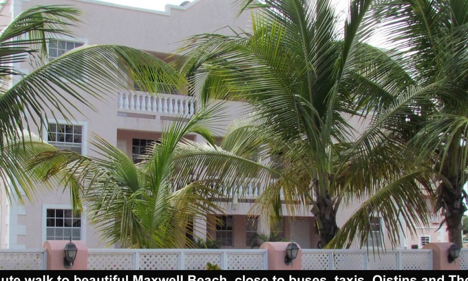 Maxwell Condo | 2 min walk to beach, buses, taxis, near stores, Oistins, The Gap. A/C and Wi-F