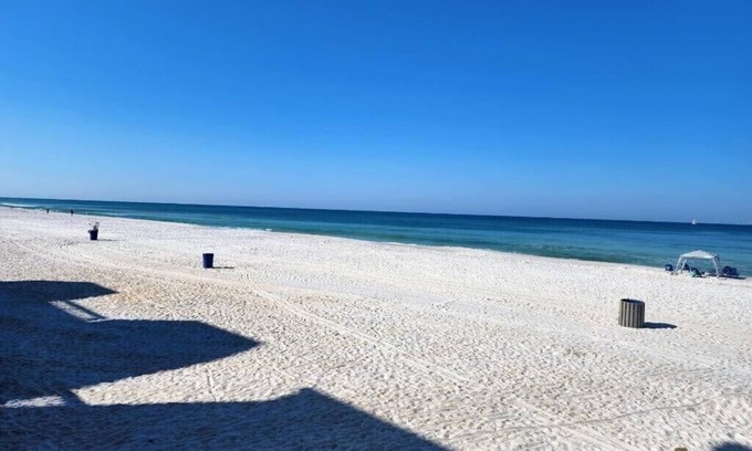 Silver Sands Beach Condo | 2022 Renovation! Surf side and stones throw from the beach!