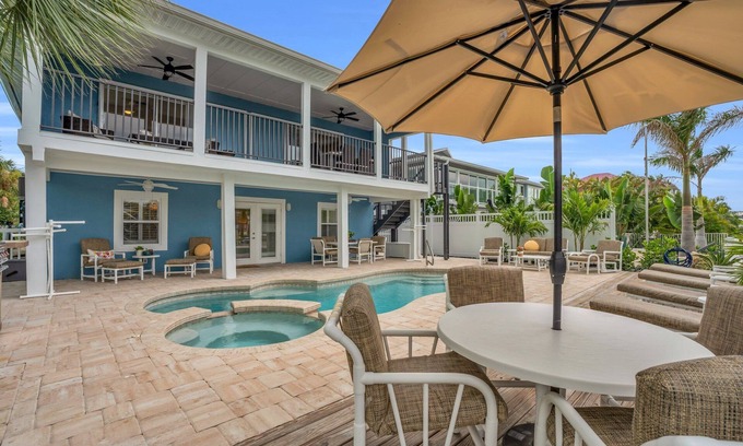 Fort Myers Beach House | 218 Canal-Front 2BR: Pool, Spa & Boat Dock Near Beach