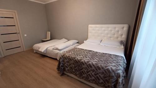 Nur-Sultan Apartment | 24-7! City Center - Bayterek ! Левый берег - Хан Шатыр ! Astana Arena - Barys Arena ! Кардиоцентр - Центр материнства -РДЦ! Ботанический сад