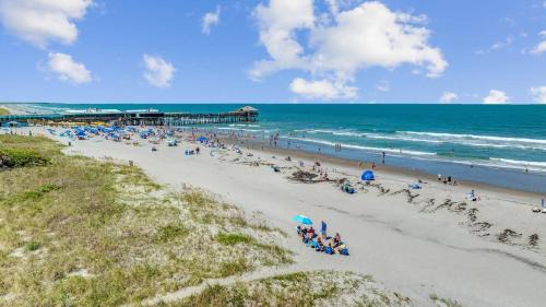 Avon By The Sea House | 2BR Beachfront Condo with Pool BBQ & Steps To Pier