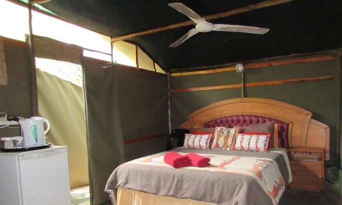 Thorny Bush Game Reserve Cabin | 3 bed bush-tent under 3 trees, for couple plus chaperone. Free lion/hyena sounds