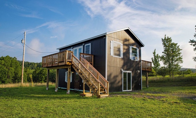 De Lancey Cabin | 30 min to Cooperstown All Star Village 7 acres Creek Game Room Hot Tub
